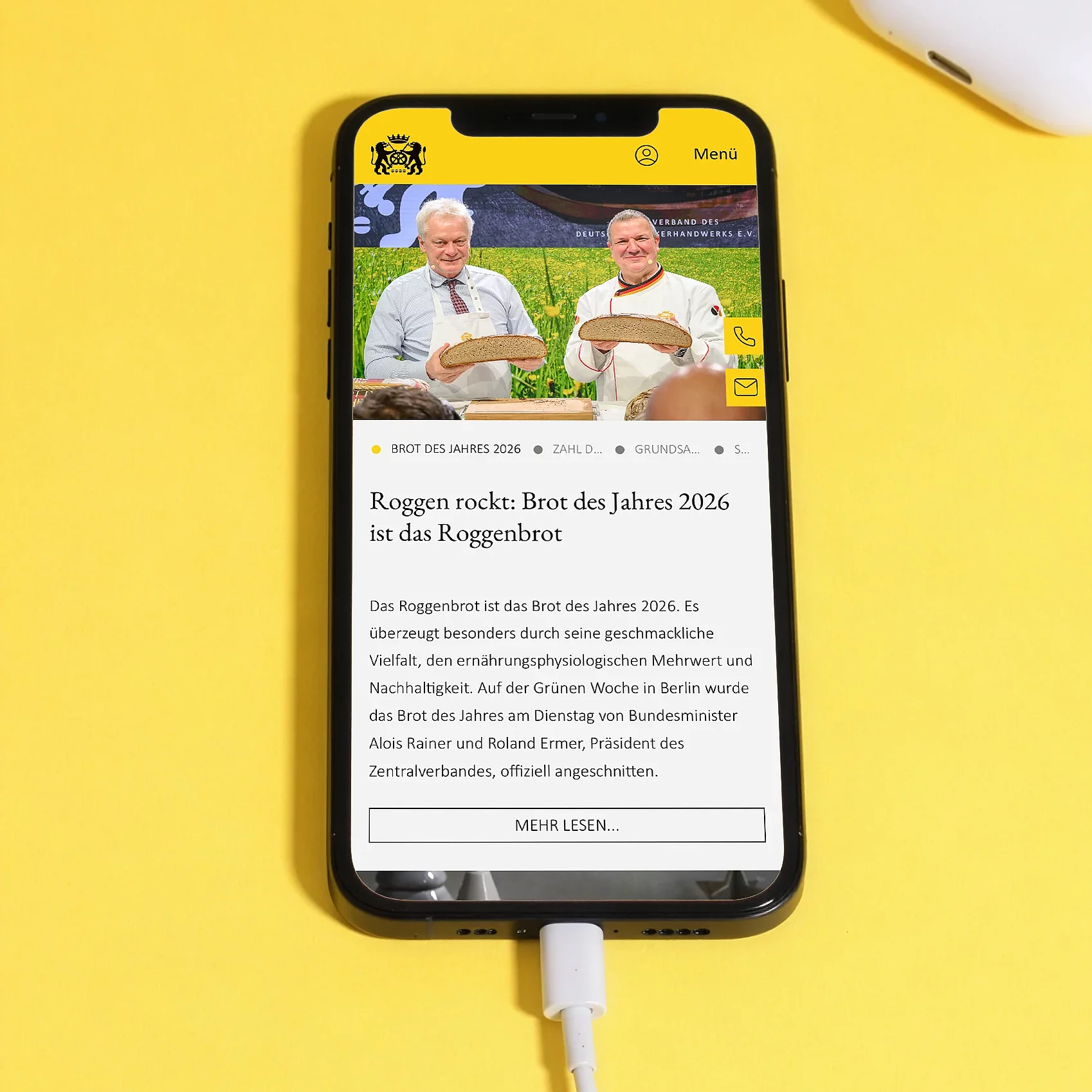 Website des Deutschen Bäckerhandwerks auf einem Smartphone mit einem Beitrag zum Roggenbrot als Brot des Jahres 2026